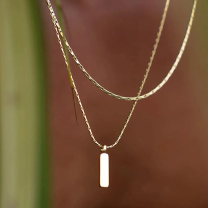 Bone chain with wire pendant