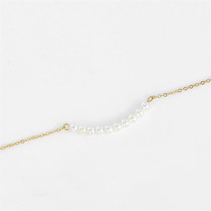 Women's gold necklace with imitation pearl pendant