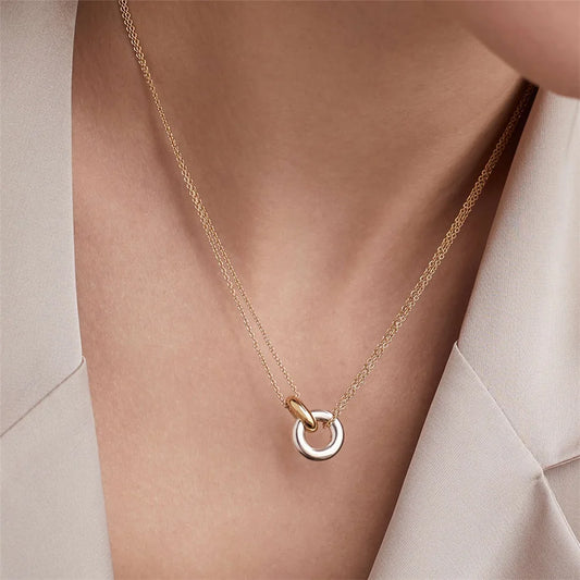 Two-tone pendant chokers